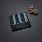 Raw Silk Teal Green Saree With Zari Stripes Design And Simple Border