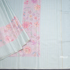 Tussar Light Pista Green Borderless Saree With Zari Stripes And Printed Design