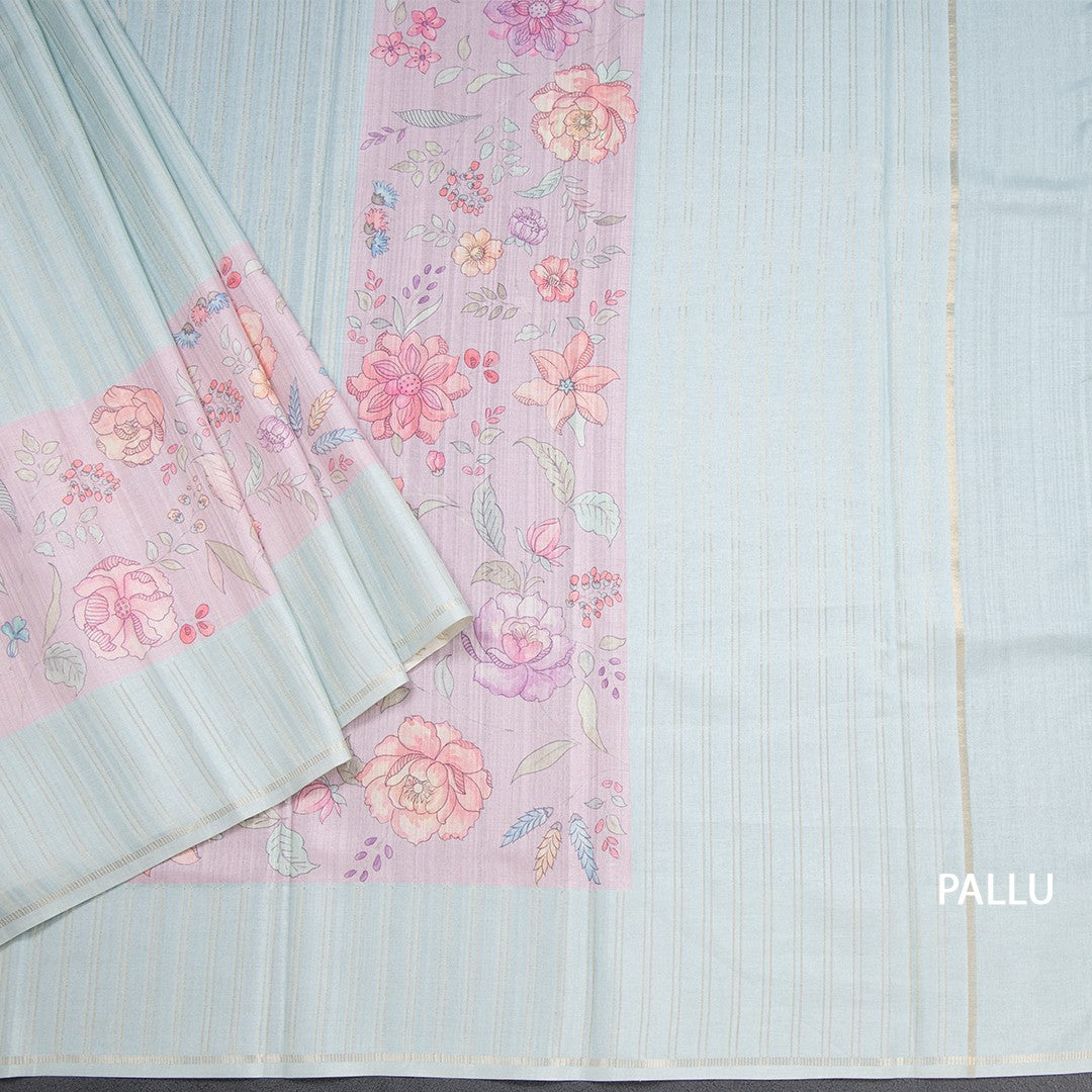Tussar Light Pista Green Borderless Saree With Zari Stripes And Printed Design