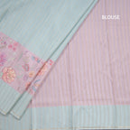 Tussar Light Pista Green Borderless Saree With Zari Stripes And Printed Design