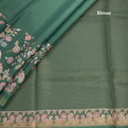 Raw Silk Green Printed Saree With Zari Border