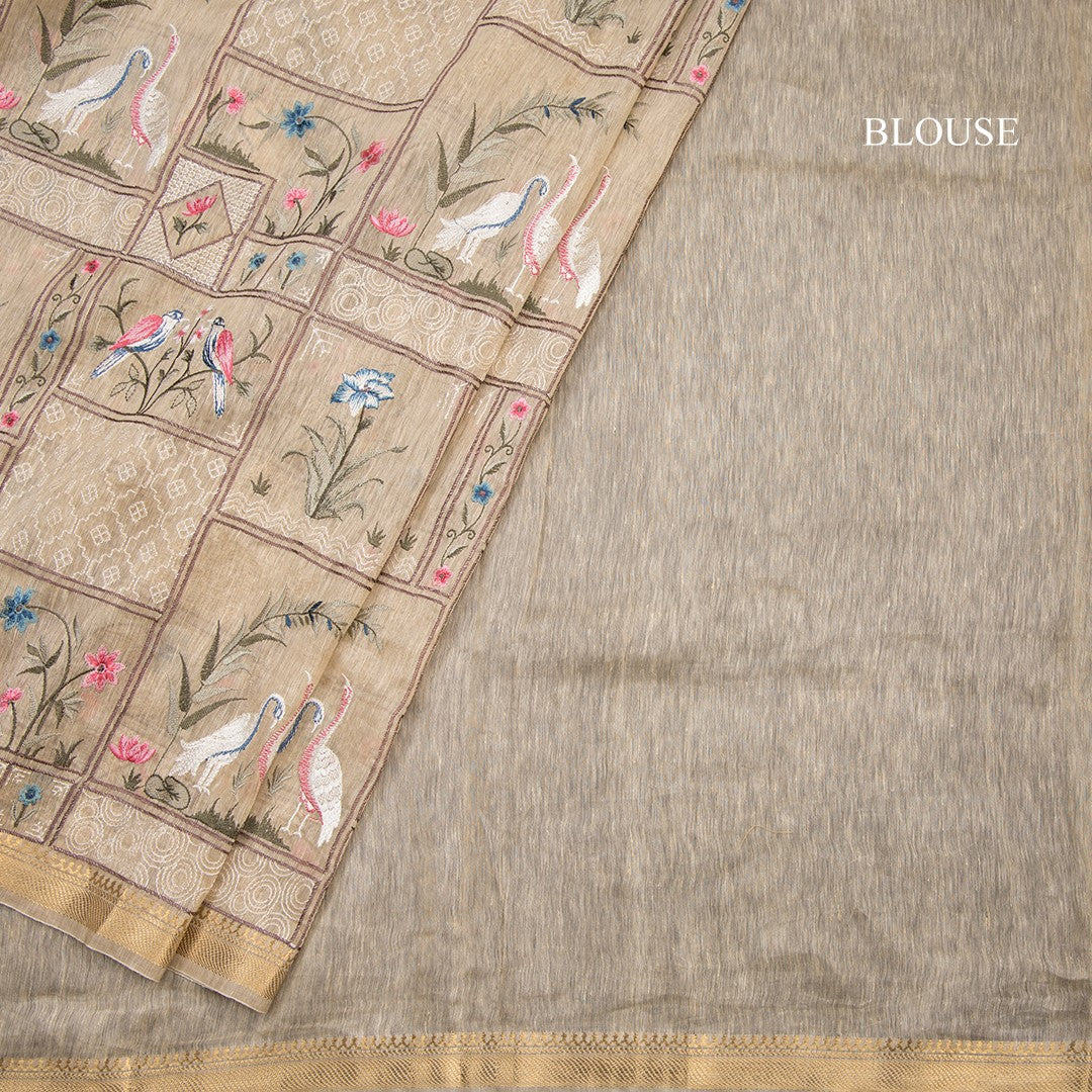Linen Cream Thread Embroidered Saree With Zari Border