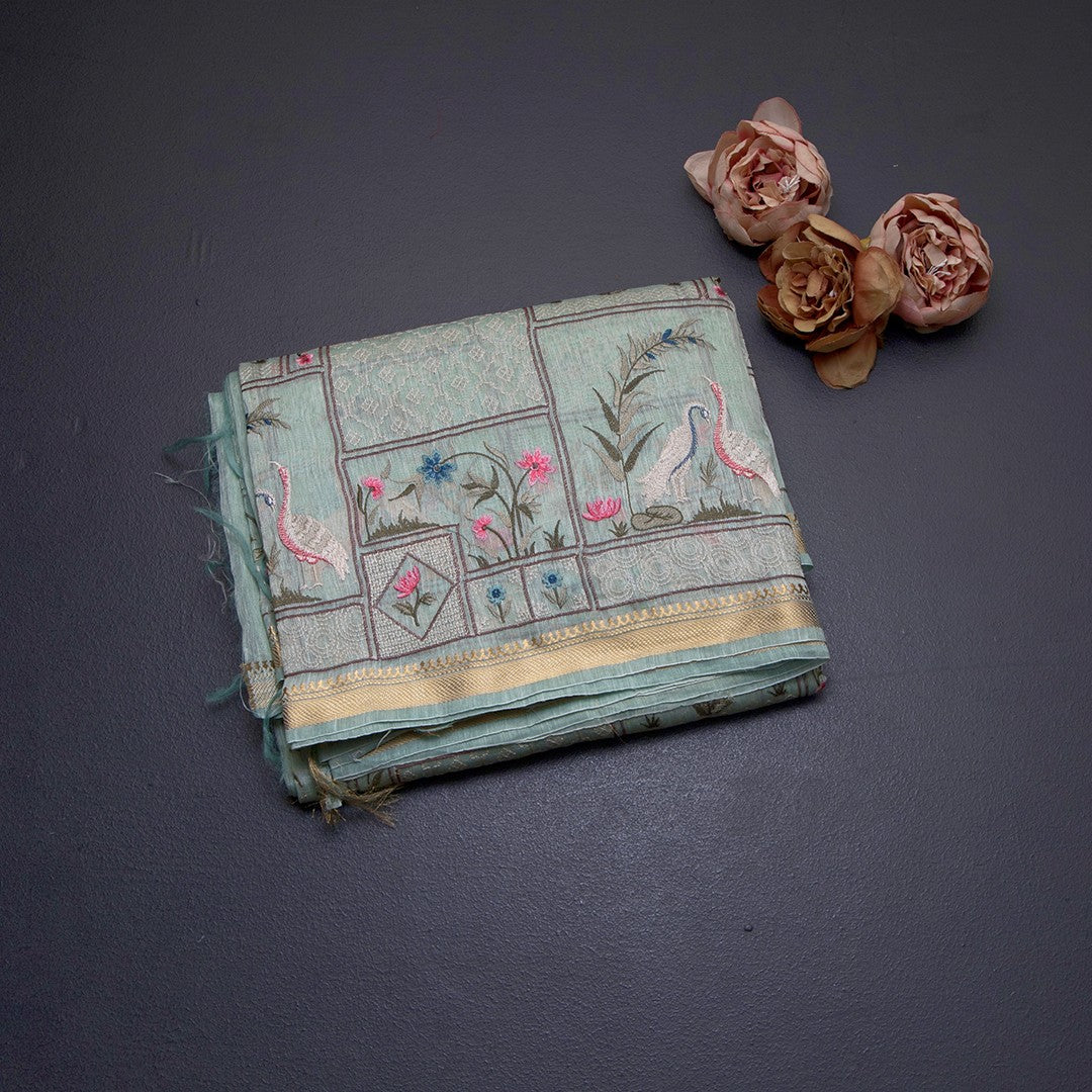 Linen Light Green Thread Embroidered Saree With Zari Border