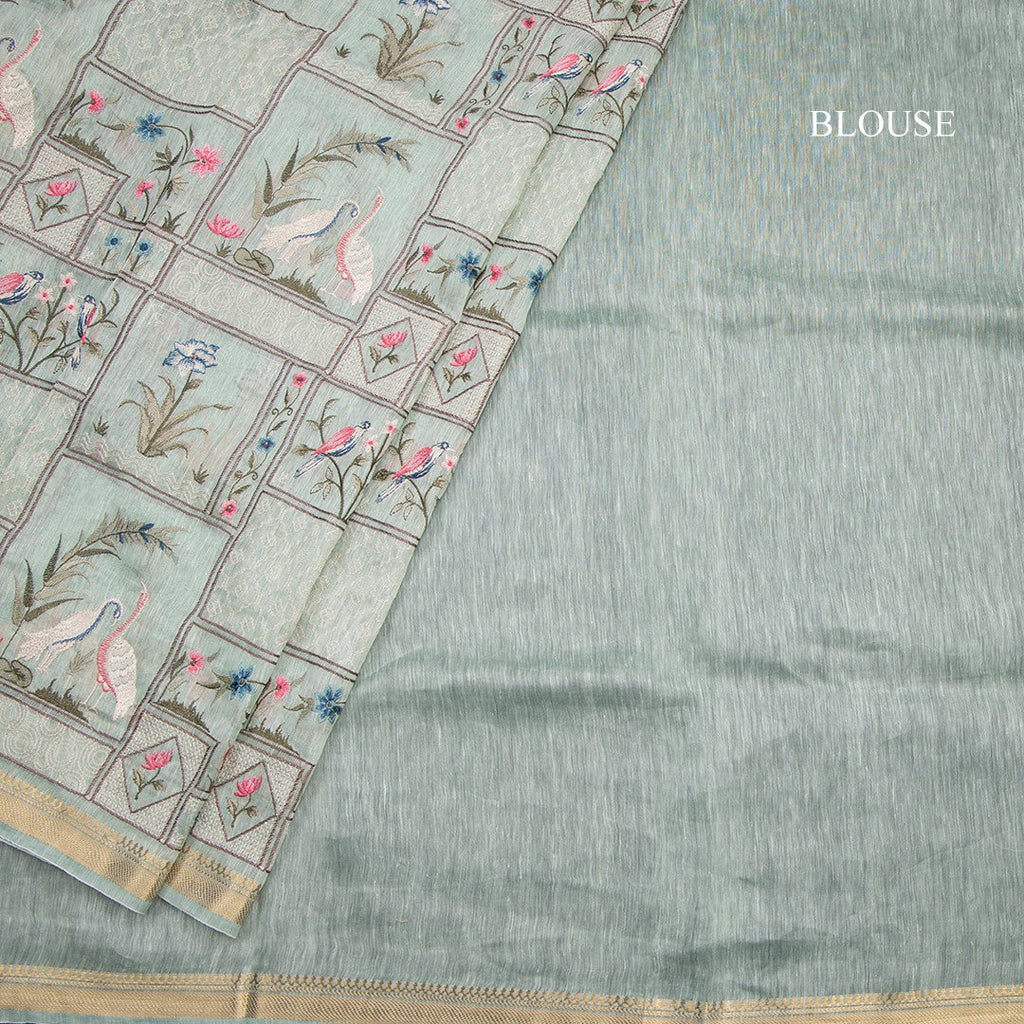 Linen Light Green Thread Embroidered Saree With Zari Border
