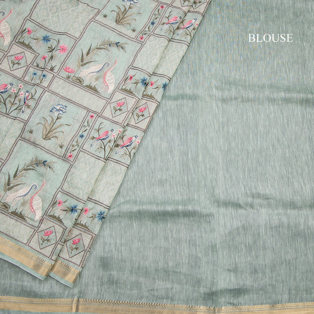 Linen Light Green Thread Embroidered Saree With Zari Border