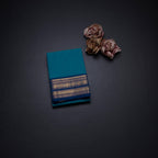 Kanchi Cotton Peacock Blue Saree With Zari Buttas And Zari Border