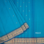 Kanchi Cotton Peacock Blue Saree With Zari Buttas And Zari Border