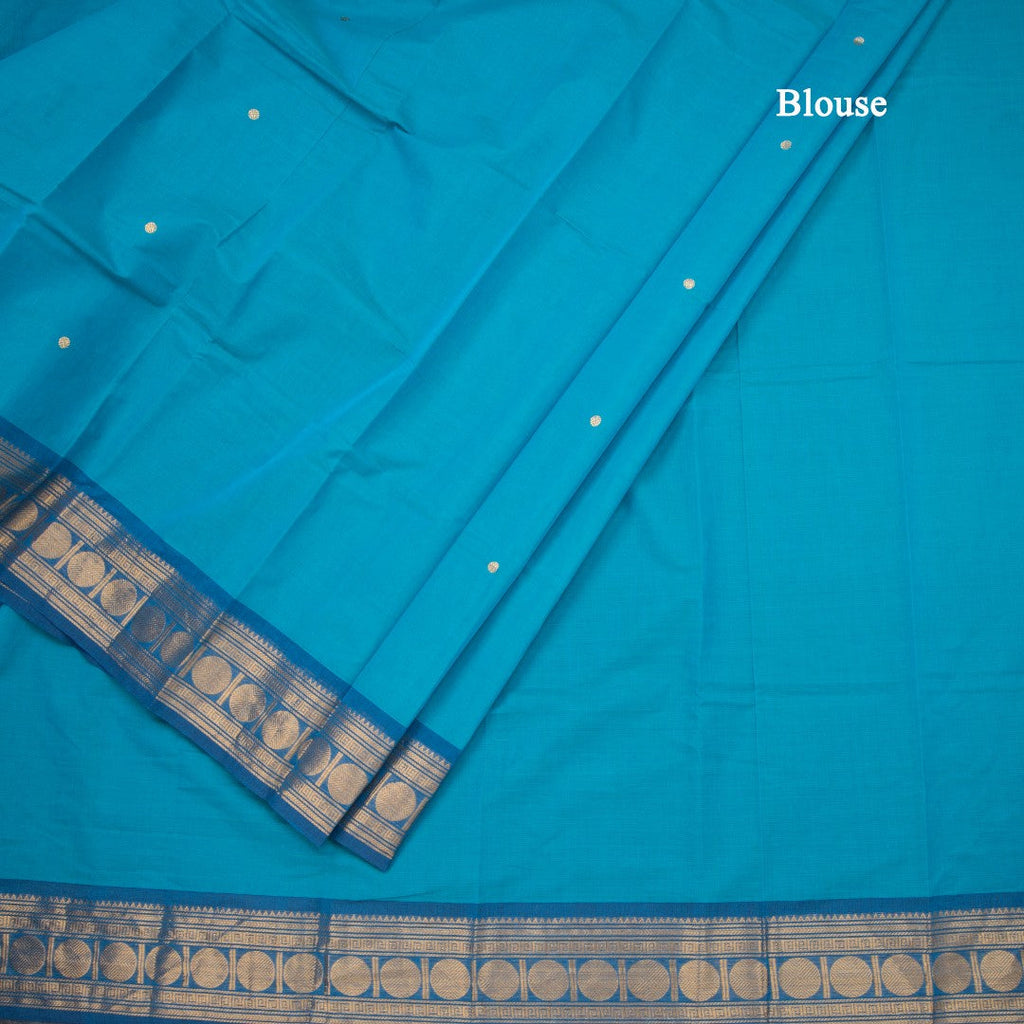 Kanchi Cotton Peacock Blue Saree With Zari Buttas And Zari Border