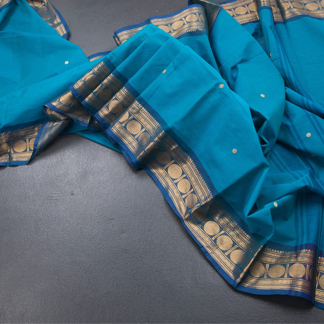 Kanchi Cotton Peacock Blue Saree With Zari Buttas And Zari Border