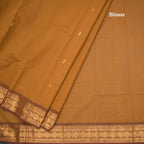 Kanchi Cotton Golden Brown Saree With Zari Buttas And Zari Border
