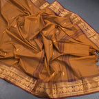 Kanchi Cotton Golden Brown Saree With Zari Buttas And Zari Border - Kumaran Silks
