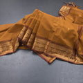 Kanchi Cotton Golden Brown Saree With Zari Buttas And Zari Border