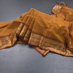 Kanchi Cotton Golden Brown Saree With Zari Buttas And Zari Border
