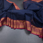 Kanchi Cotton Navy Blue Saree With Thread Buttas And Zari Border