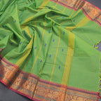 Kanchi Cotton Parrot Green Saree With Thread Buttas And Zari Border - Kumaran Silks