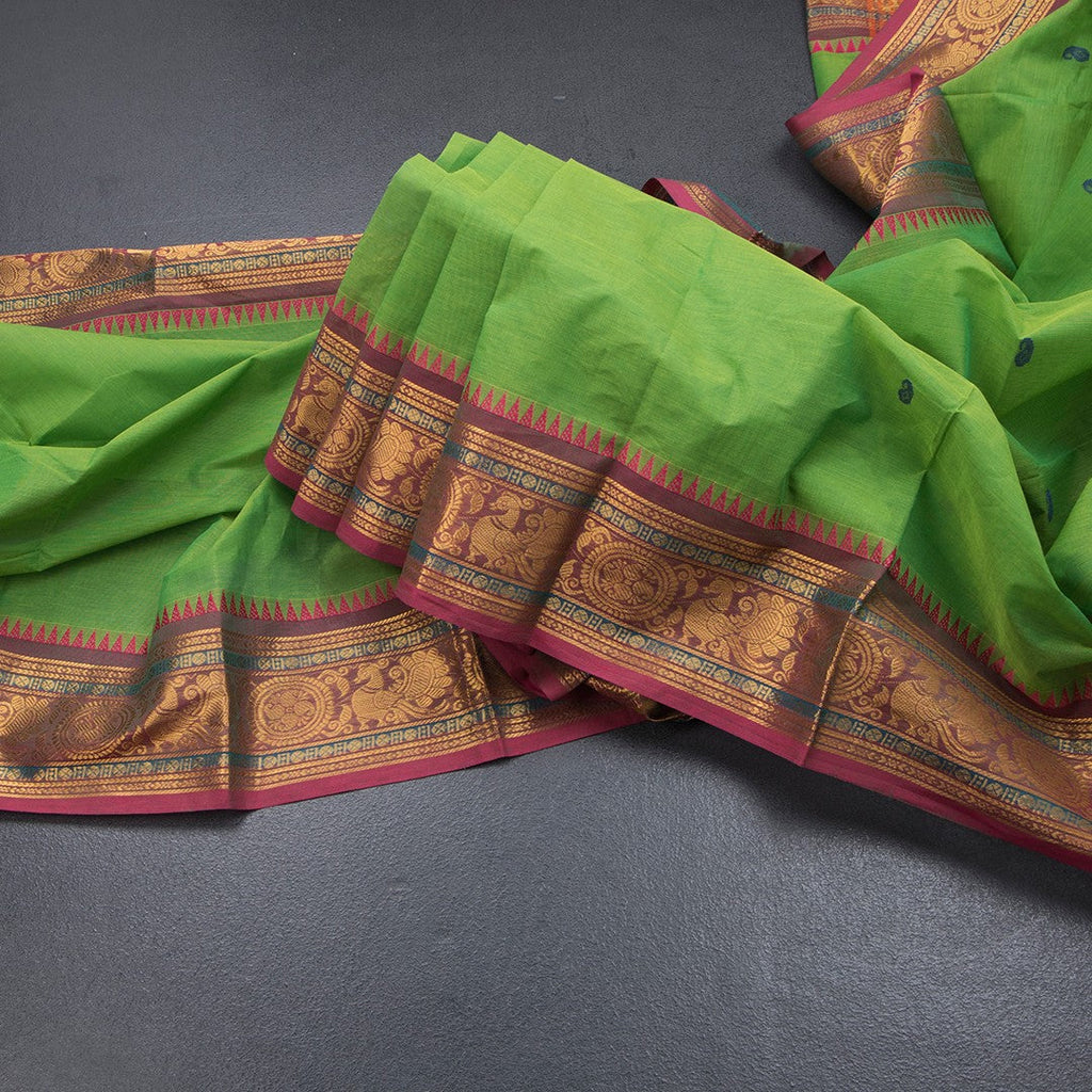 Kanchi Cotton Parrot Green Saree With Thread Buttas And Zari Border