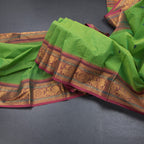 Kanchi Cotton Parrot Green Saree With Thread Buttas And Zari Border