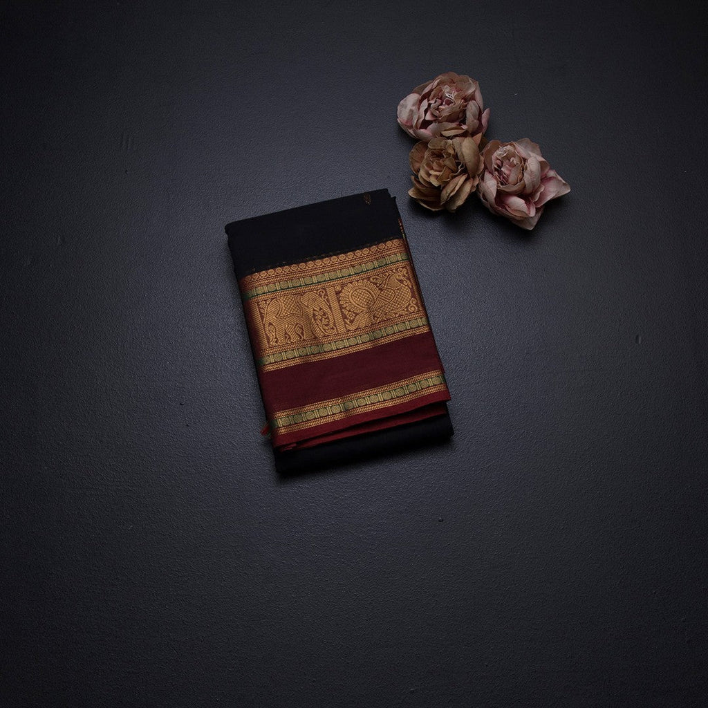 Kanchi Cotton Black Saree With Zari Buttas And Zari Border