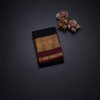 Kanchi Cotton Black Saree With Zari Buttas And Zari Border