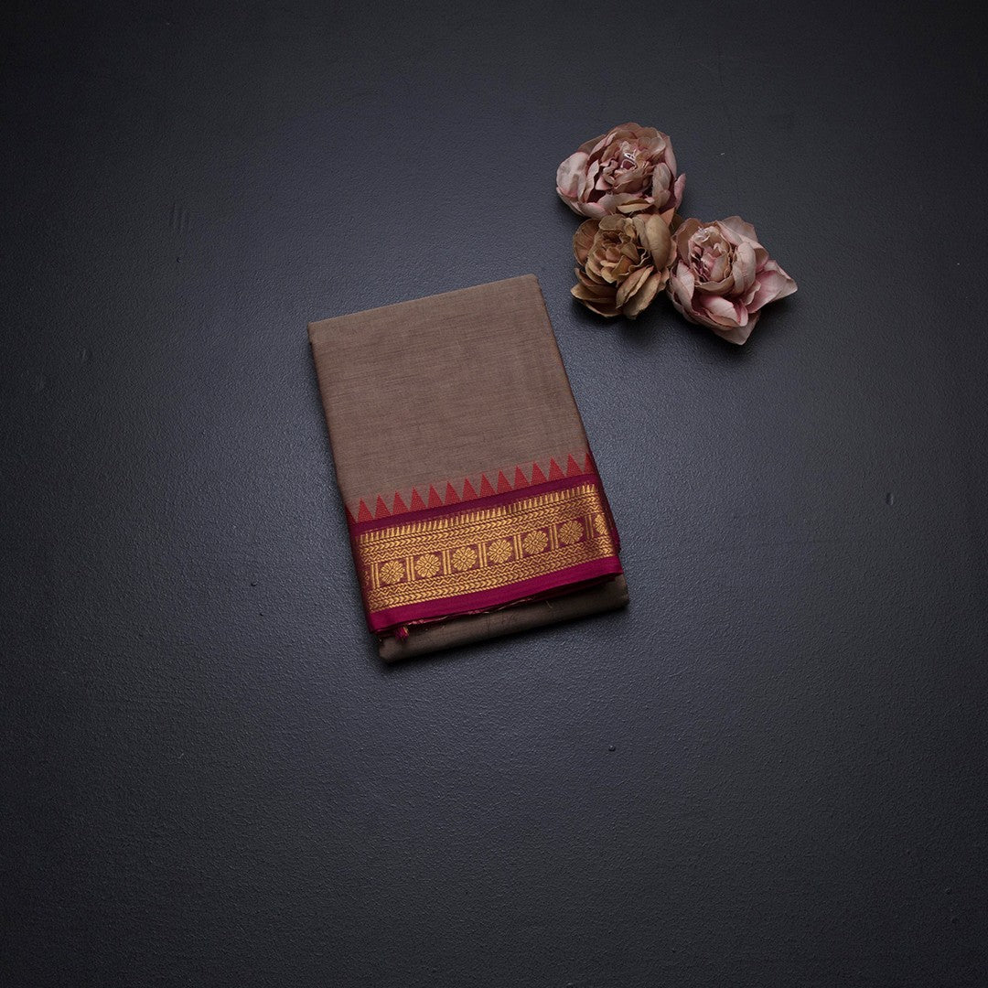 Kanchi Cotton Light Brown Plain Saree And Temple Border