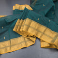 Kanchi Cotton Dark Green Saree With Zari Buttas And Zari Border