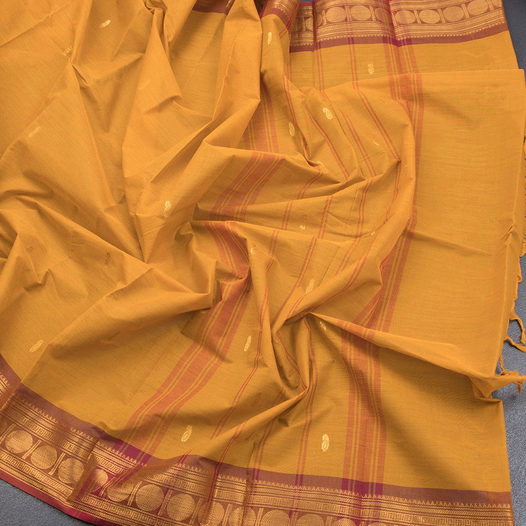 Kanchi Cotton Mustard Saree With Zari Buttas And Zari Border - Kumaran Silks