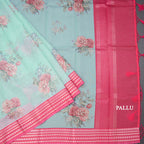 Kota Turquiose Blue Floral Printed Saree And Zari Border