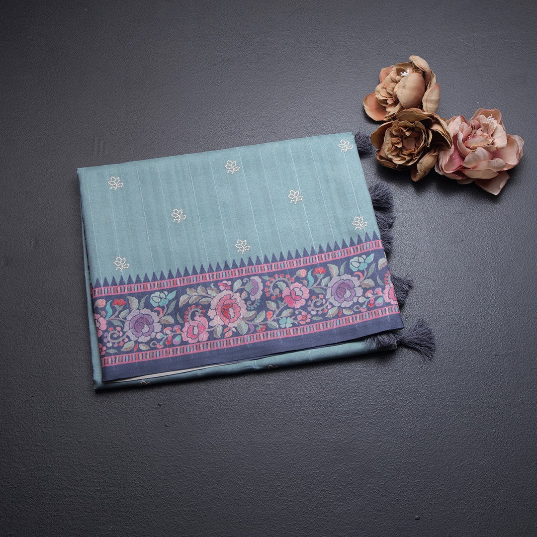 Raw Silk Powder Blue Saree With Thread Buttas And Printed Border