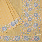 Raw Silk Pastel Yellow Saree With Zari Stripes And Thread Border