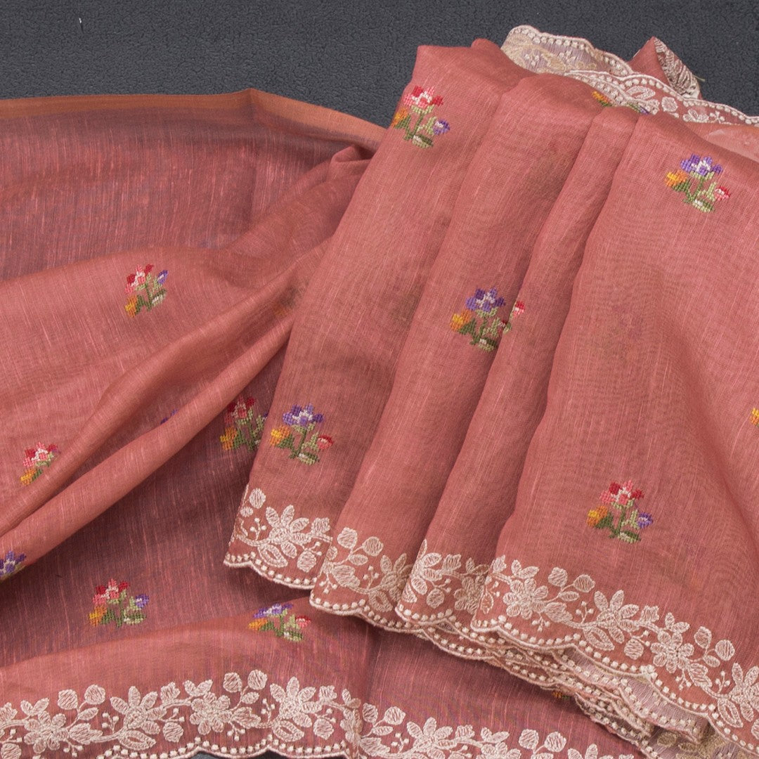 Linen Peach Saree With Floral Thread Buttas And Thread Border