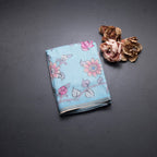 Semi Raw Silk Sky Blue Printed Saree With Floral Creeper Design