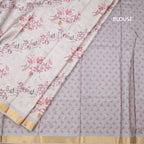 Raw Silk Cream Zari Checked With floral Printed Saree And Zari Border