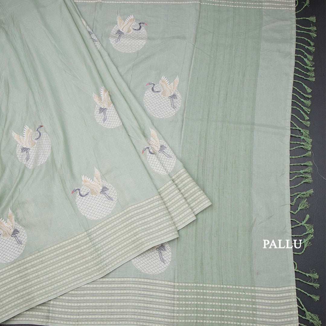 Raw Silk Light Green Thread Work Saree In Bird Design