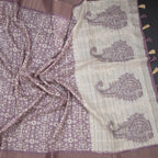 Raw silk purple printed saree with zari border from Shriyara Life, showcasing intricate print and elegant border details.