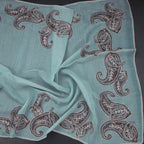 Linen sea green borderless saree with intricate thread work and paisley design, featuring elegant craftsmanship by Shriyara Life.