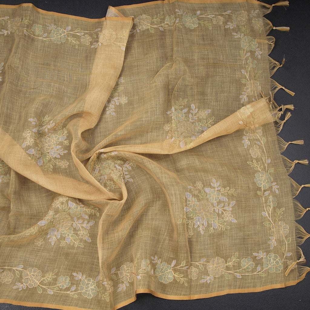 Linen gold saree with intricate zari thread work, displayed with detailed embroidery and elegant drape from Shriyara Life.
