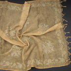 Linen gold saree with intricate zari thread work, displayed with detailed embroidery and elegant drape from Shriyara Life.