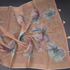 Linen light peach floral paint saree with intricate thread work, crafted by Shriyara Life, displayed on a mannequin.