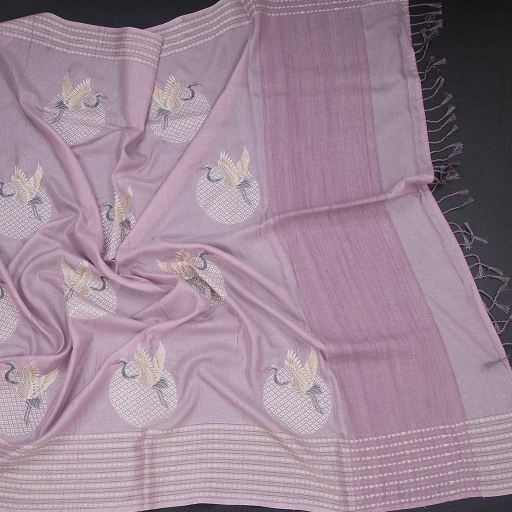 Raw silk light lavender saree with intricate bird thread work, showcasing elegant craftsmanship by Shriyara Life.