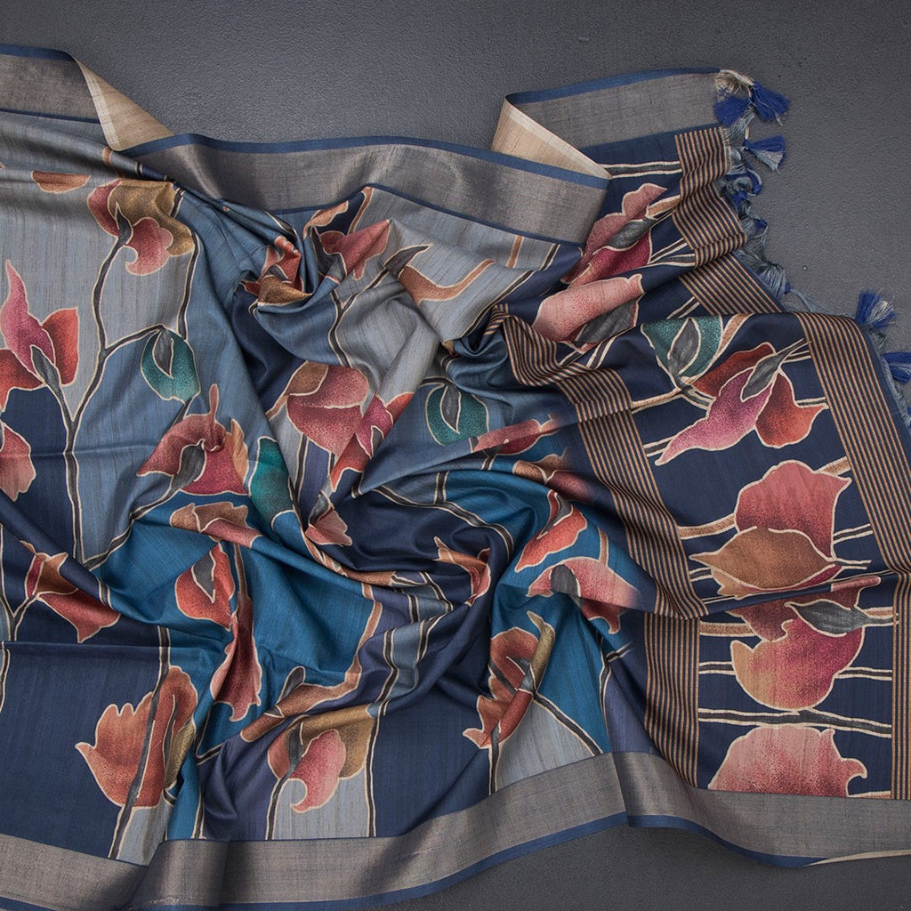Raw silk blue printed saree with zari border by Shriyara Life, showcasing intricate patterns and elegant craftsmanship.