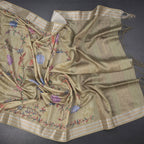 Raw silk saree with pistachio green floral print and zari border by Shriyara Life, featuring intricate embroidery and elegant draping.