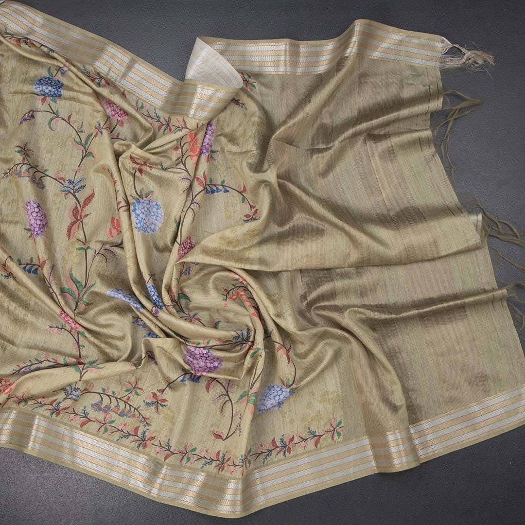 Raw silk saree with pistachio green floral print and zari border by Shriyara Life, featuring intricate embroidery and elegant draping.
