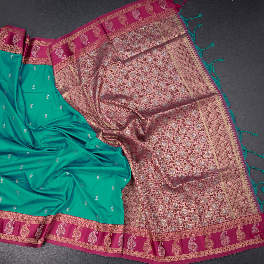 Art Silk Peacock Green Saree With Zari Buttas And Mango Border