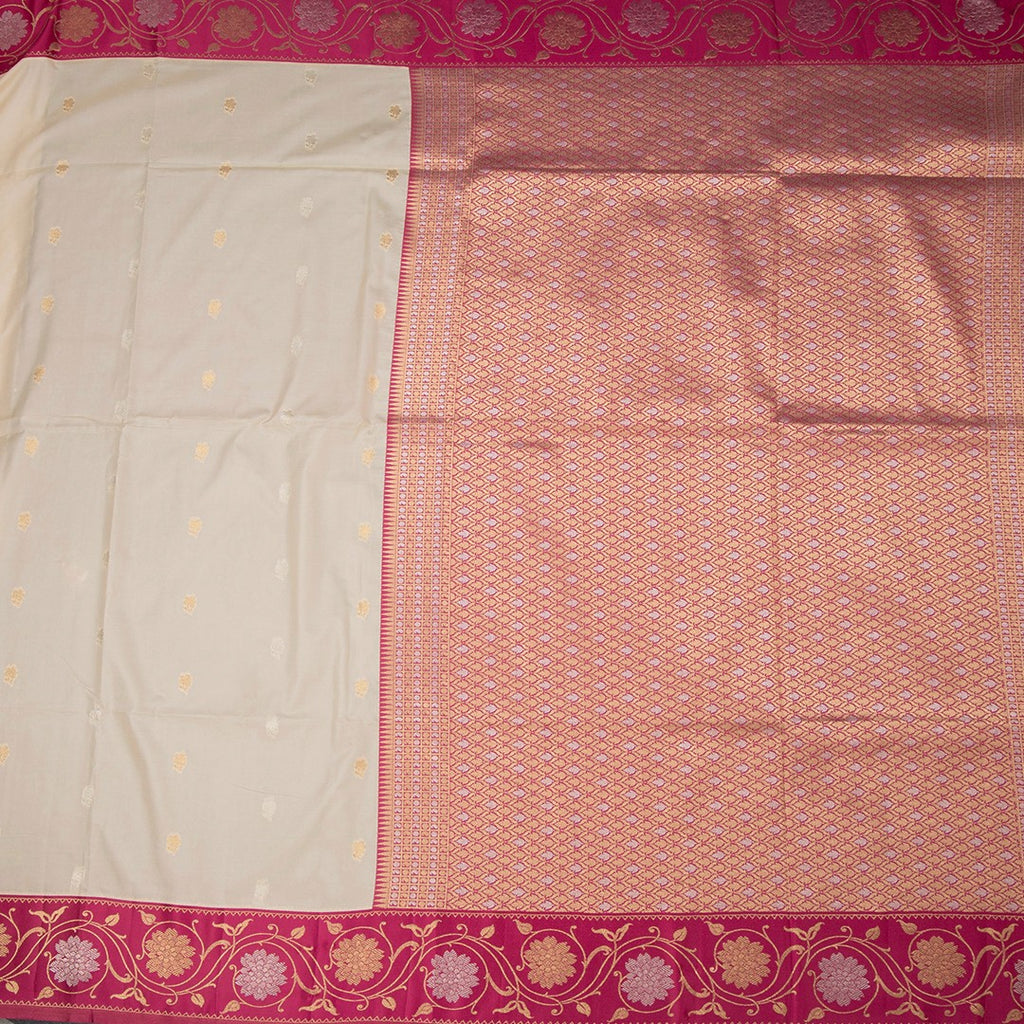 Art Silk Cream Saree With Zari Buttas And Floral Border