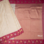 Art Silk Cream Saree With Zari Buttas And Floral Border