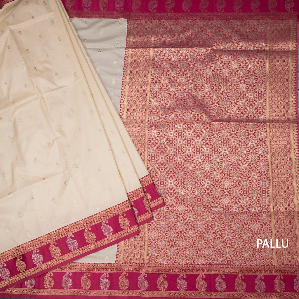 Art Silk Cream Saree With Zari Buttas And Mango Border