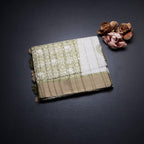 Raw Silk Green Printed Saree And Zari Border