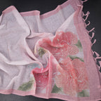 Light pink linen saree with borderless floral print from Shriyara Life, showcasing elegant fabric and vibrant floral design.
