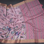 Semi raw silk saree with pink floral print by Shriyara Life, showcasing elegant taffy pink fabric and intricate floral design.