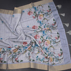 Semi raw silk grey printed saree with tree design from Shriyara Life, showcasing intricate patterns and elegant drape.